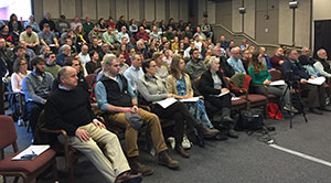 Mack personnel listening to ISO standards brief